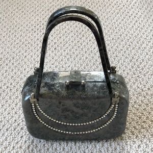 Vintage handbag with double crystal swags. Hinged handles.